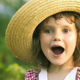 Smiling girl with sun hat