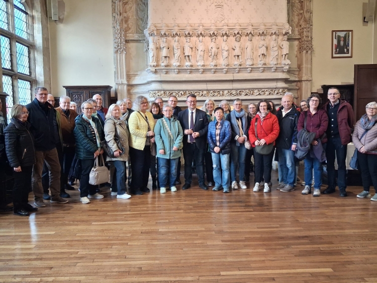 Die Reisegruppe zu Gast im Rathaus von Saint-Quentin mit dem Beigeordneten Alexis Grandin (Mitte). © Stadt Kaiserslautern