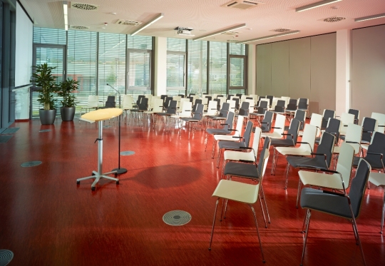The conference room with lectern and microphone. © Business + Innovation Center 
